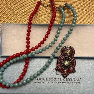 Touchstone crystal pendant with two necklaces